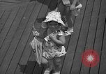 Image of children's parade on the boardwalk Ocean City New Jersey USA, 1939, second 31 stock footage video 65675042797