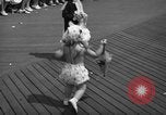Image of children's parade on the boardwalk Ocean City New Jersey USA, 1939, second 35 stock footage video 65675042797