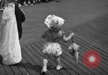 Image of children's parade on the boardwalk Ocean City New Jersey USA, 1939, second 37 stock footage video 65675042797