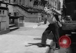 Standbild Paddleball United States USA, 1962, aus Sekunde 11 historischem Filmmaterial Videoclip 65675042817