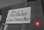Standbild Flohmarkt New York United States USA, 1963, aus Sekunde 8 historischem Filmmaterial Videoclip 65675042834