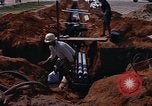 Standbild die Verlegung von Rohrleitungen Thailand, 1966, aus Sekunde 11 historischem Filmmaterial Videoclip 65675042838