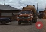 Image of pouring cement Thailand, 1966, second 9 stock footage video 65675042841