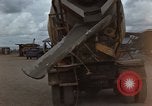 Image of pouring cement Thailand, 1966, second 12 stock footage video 65675042841