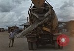 Image of pouring cement Thailand, 1966, second 15 stock footage video 65675042841