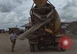 Image of pouring cement Thailand, 1966, second 16 stock footage video 65675042841