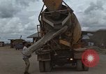 Image of pouring cement Thailand, 1966, second 17 stock footage video 65675042841