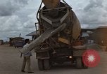 Image of pouring cement Thailand, 1966, second 18 stock footage video 65675042841