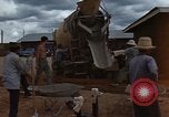 Image of pouring cement Thailand, 1966, second 32 stock footage video 65675042841