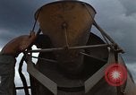 Image of pouring cement Thailand, 1966, second 35 stock footage video 65675042841