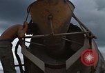 Image of pouring cement Thailand, 1966, second 36 stock footage video 65675042841