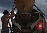 Image of pouring cement Thailand, 1966, second 38 stock footage video 65675042841