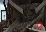 Image of pouring cement Thailand, 1966, second 41 stock footage video 65675042841