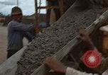 Image of pouring cement Thailand, 1966, second 42 stock footage video 65675042841