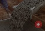 Image of pouring cement Thailand, 1966, second 43 stock footage video 65675042841