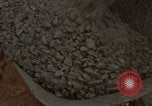 Image of pouring cement Thailand, 1966, second 44 stock footage video 65675042841