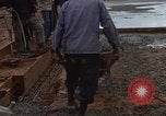 Image of pouring cement Thailand, 1966, second 51 stock footage video 65675042841