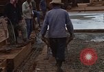 Image of pouring cement Thailand, 1966, second 52 stock footage video 65675042841