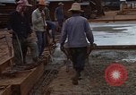 Image of pouring cement Thailand, 1966, second 53 stock footage video 65675042841
