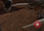 Image of pouring cement Thailand, 1966, second 56 stock footage video 65675042841