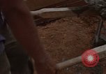 Image of pouring cement Thailand, 1966, second 57 stock footage video 65675042841