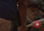 Image of pouring cement Thailand, 1966, second 58 stock footage video 65675042841