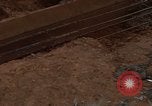 Image of pouring cement Thailand, 1966, second 61 stock footage video 65675042841