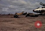 Image of 500lb bombs Vietnam, 1965, second 13 stock footage video 65675042871