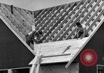 Image of suburban houses New York United States USA, 1950, second 54 stock footage video 65675042887