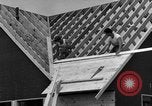 Image of suburban houses New York United States USA, 1950, second 61 stock footage video 65675042887