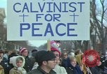Image of Peace demonstrators march protesting Vietnam War Washington DC USA, 1969, second 4 stock footage video 65675042914
