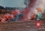 Image of colored smoke grenades United States USA, 1943, second 32 stock footage video 65675042930