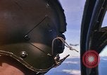 Image of A 1E Skyraider aircraft fire rockets at enemy ground target Southeast Asia, 1966, second 5 stock footage video 65675042960