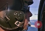 Image of A 1E Skyraider aircraft fire rockets at enemy ground target Southeast Asia, 1966, second 10 stock footage video 65675042960