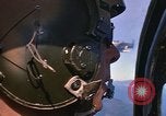 Image of A 1E Skyraider aircraft fire rockets at enemy ground target Southeast Asia, 1966, second 36 stock footage video 65675042960