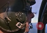 Image of A 1E Skyraider aircraft fire rockets at enemy ground target Southeast Asia, 1966, second 37 stock footage video 65675042960