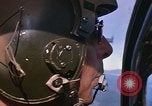Image of A 1E Skyraider aircraft fire rockets at enemy ground target Southeast Asia, 1966, second 38 stock footage video 65675042960