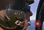 Image of A 1E Skyraider aircraft fire rockets at enemy ground target Southeast Asia, 1966, second 40 stock footage video 65675042960