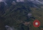 Image of A 1E Skyraider aircraft fire rockets at enemy ground target Southeast Asia, 1966, second 48 stock footage video 65675042960