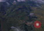 Image of A 1E Skyraider aircraft fire rockets at enemy ground target Southeast Asia, 1966, second 50 stock footage video 65675042960