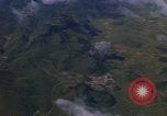 Image of A 1E Skyraider aircraft fire rockets at enemy ground target Southeast Asia, 1966, second 53 stock footage video 65675042960