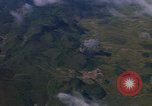 Image of A 1E Skyraider aircraft fire rockets at enemy ground target Southeast Asia, 1966, second 54 stock footage video 65675042960