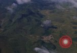 Image of A 1E Skyraider aircraft fire rockets at enemy ground target Southeast Asia, 1966, second 55 stock footage video 65675042960
