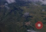 Image of A 1E Skyraider aircraft fire rockets at enemy ground target Southeast Asia, 1966, second 58 stock footage video 65675042960
