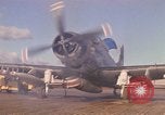 Image of A-1E Skyraider aircraft operating on ground Southeast Asia, 1966, second 1 stock footage video 65675042967
