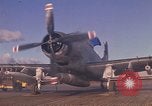 Image of A-1E Skyraider aircraft operating on ground Southeast Asia, 1966, second 4 stock footage video 65675042967
