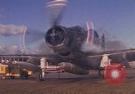 Image of A-1E Skyraider aircraft operating on ground Southeast Asia, 1966, second 8 stock footage video 65675042967