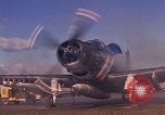 Image of A-1E Skyraider aircraft operating on ground Southeast Asia, 1966, second 9 stock footage video 65675042967