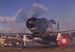 Image of A-1E Skyraider aircraft operating on ground Southeast Asia, 1966, second 10 stock footage video 65675042967