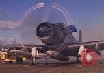 Image of A-1E Skyraider aircraft operating on ground Southeast Asia, 1966, second 12 stock footage video 65675042967
